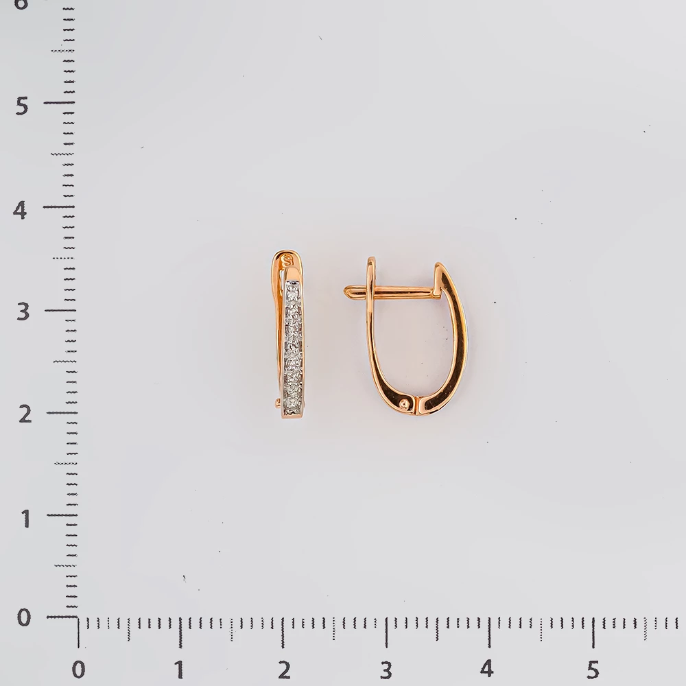 Серьги с бриллиантом из красного золота 585 пробы