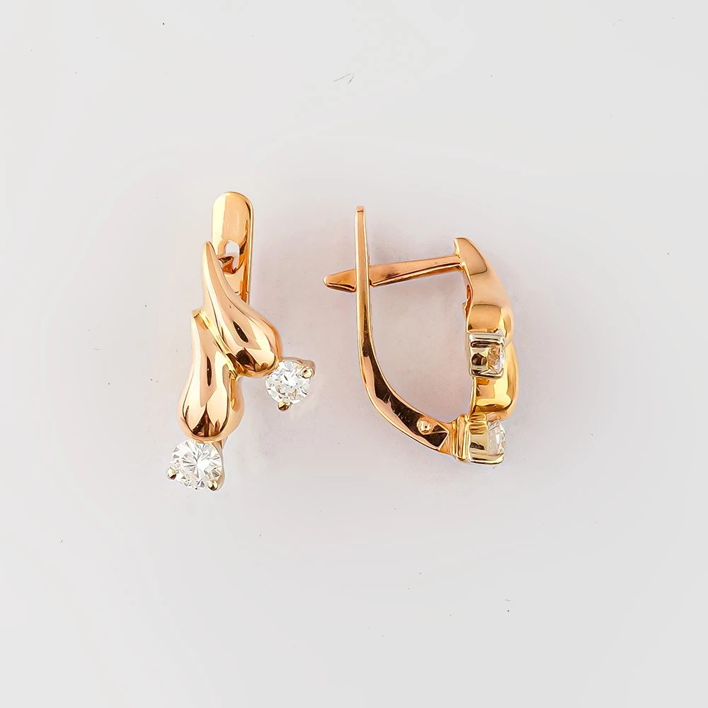 Серьги с бриллиантом из красного золота 585 пробы