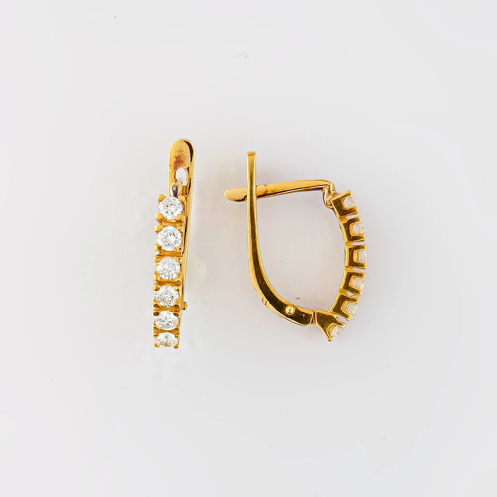 Серьги с бриллиантом из желтого золота 750 пробы