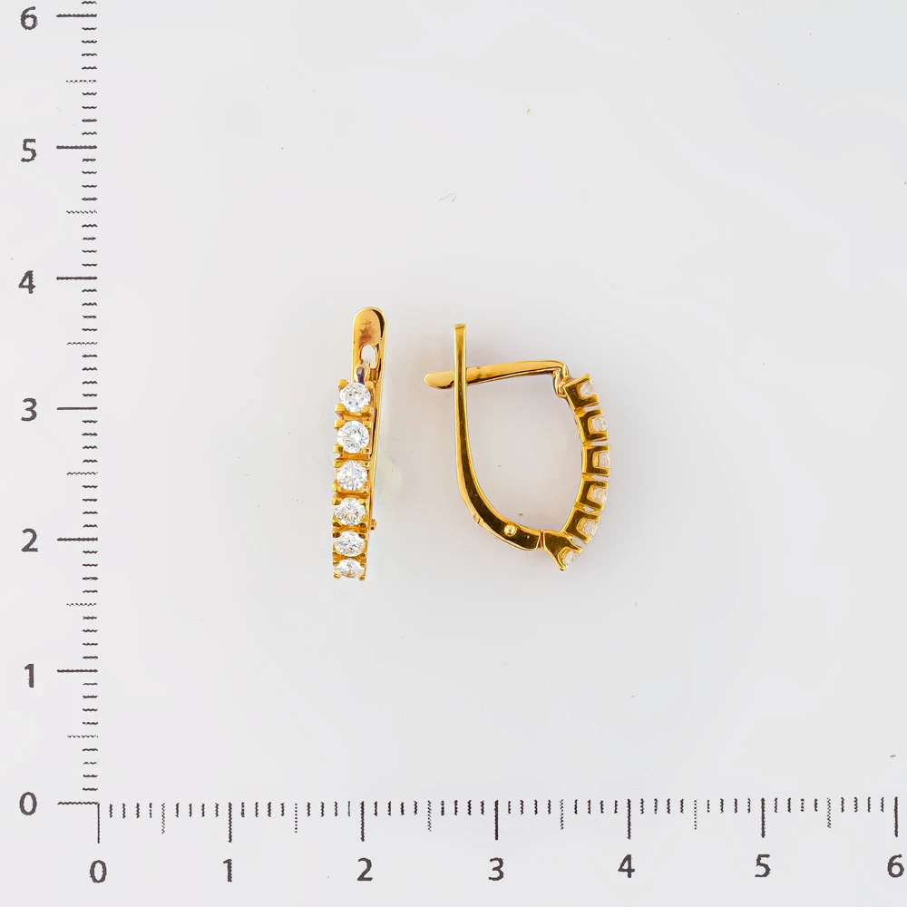 Серьги с бриллиантом из желтого золота 750 пробы