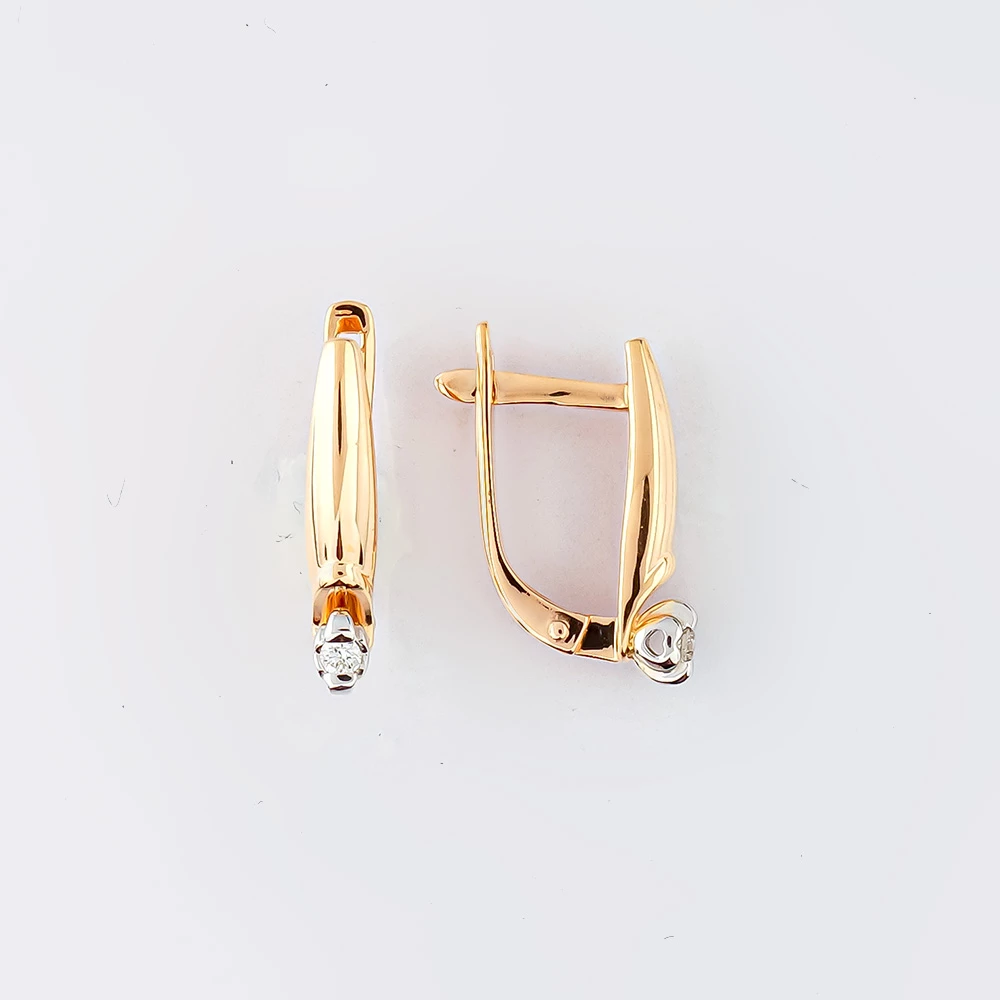 Серьги с бриллиантом из красного золота 585 пробы