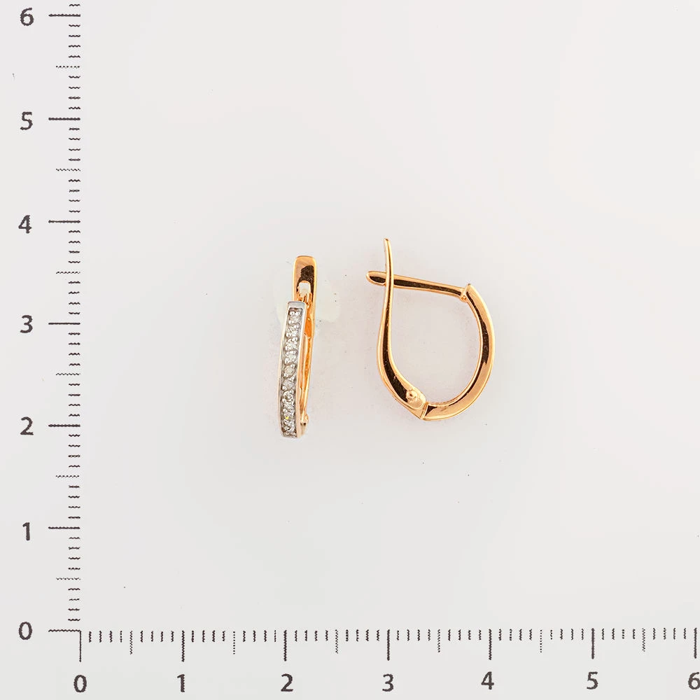 Серьги с бриллиантом из красного золота 585 пробы