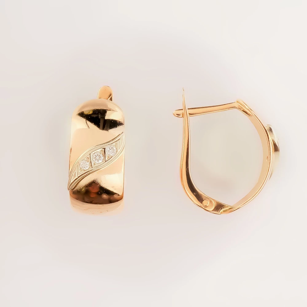 Серьги с бриллиантом из красного золота 585 пробы