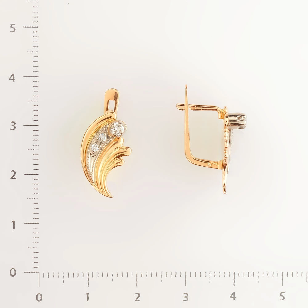 Серьги с бриллиантом из красного золота 585 пробы