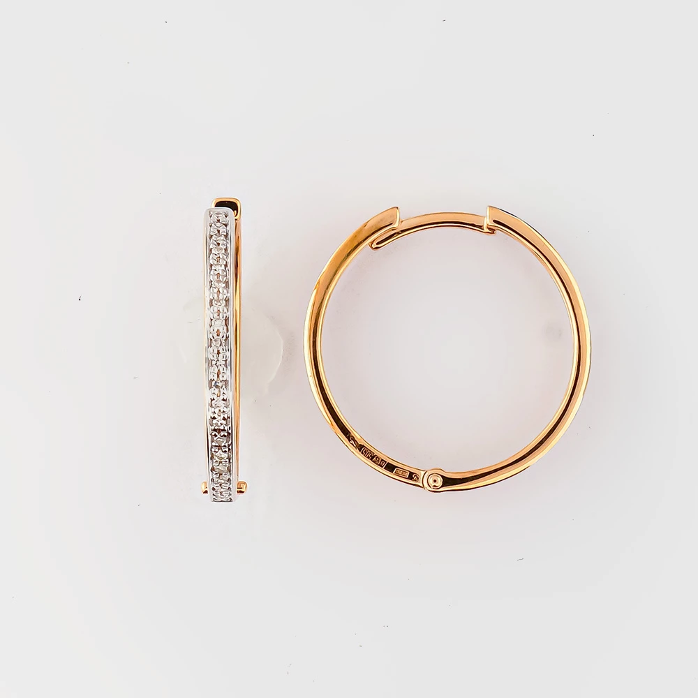 Серьги с бриллиантом из красного золота 585 пробы