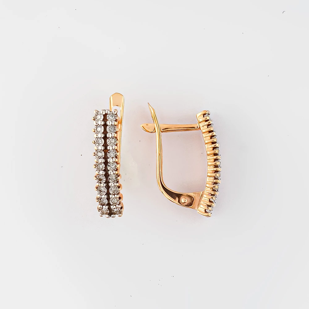 Серьги с бриллиантом из красного золота 585 пробы