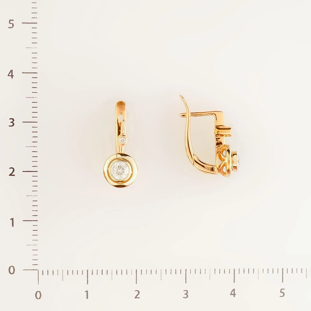 Серьги с бриллиантом из красного золота 585 пробы