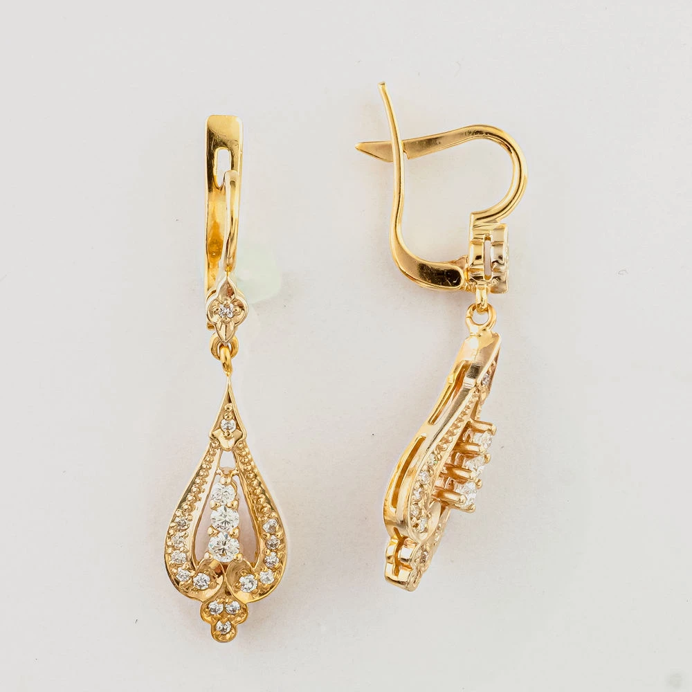 Серьги с бриллиантом из красного золота 585 пробы