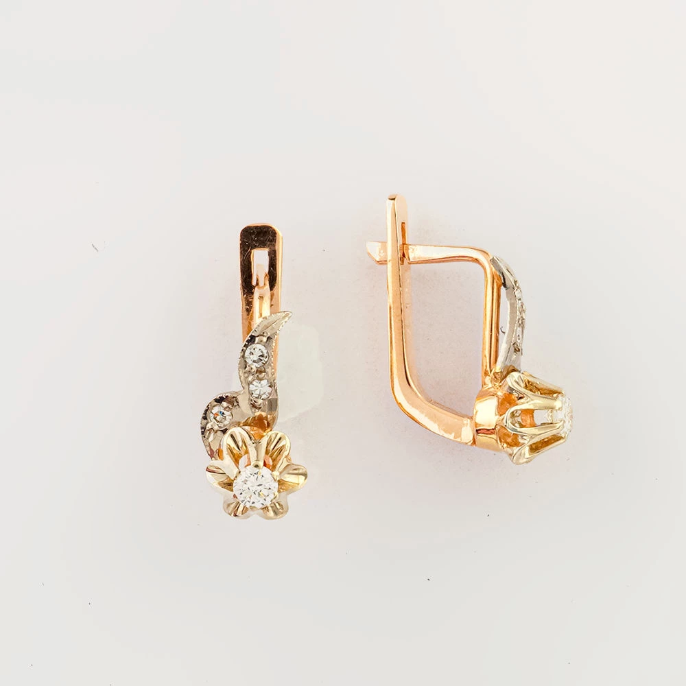 Серьги с бриллиантом из красного золота 583 пробы