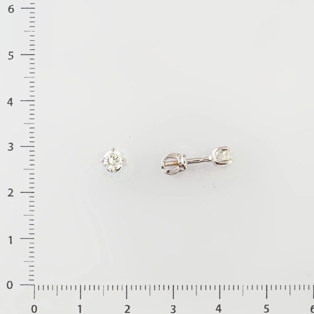 Серьги с бриллиантом из белого золота 585 пробы