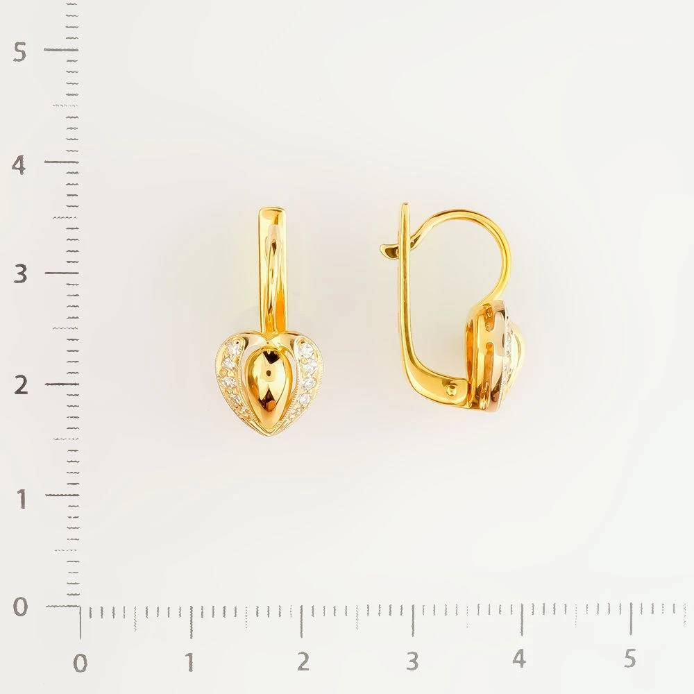 Серьги с бриллиантом из желтого золота 750 пробы