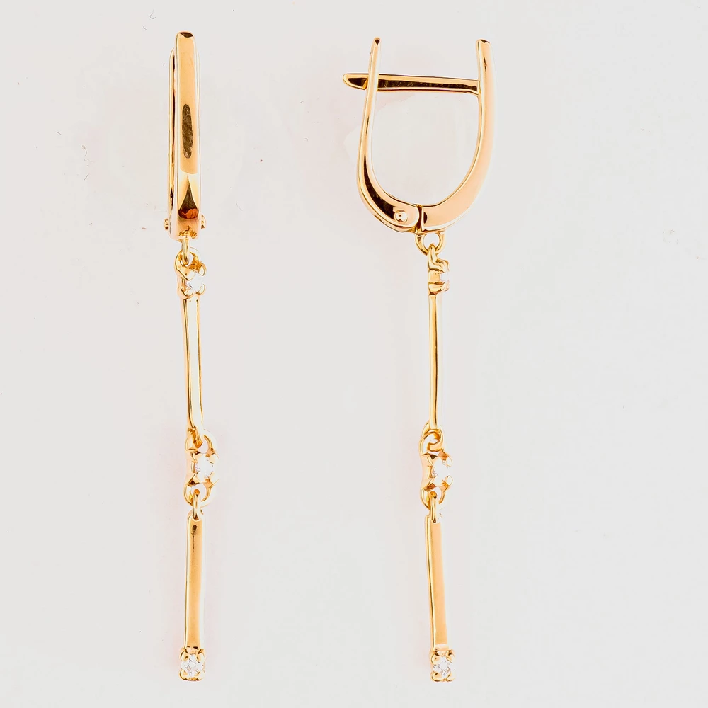 Серьги с бриллиантом из красного золота 585 пробы