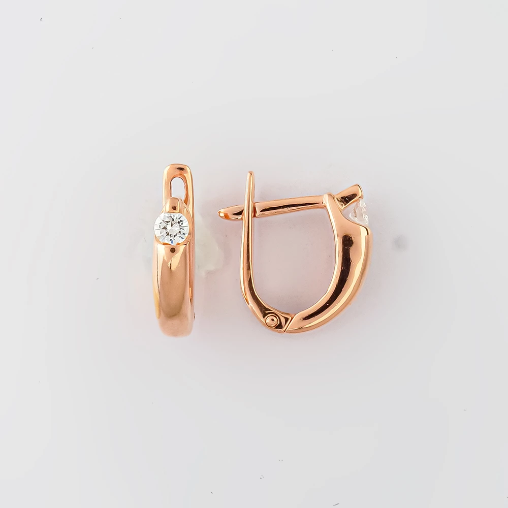 Серьги с бриллиантом из красного золота 585 пробы