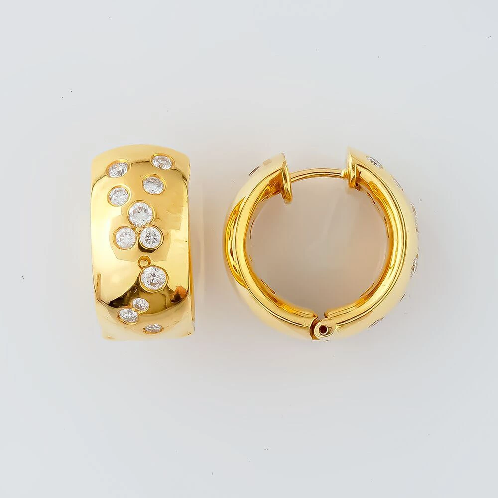 Серьги конго с бриллиантом из желтого золота 750 пробы