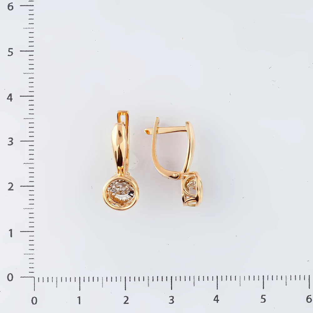 Серьги с бриллиантом из красного золота 585 пробы