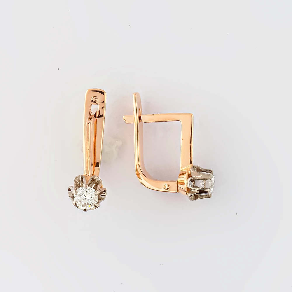 Серьги с бриллиантом из красного золота 583 пробы