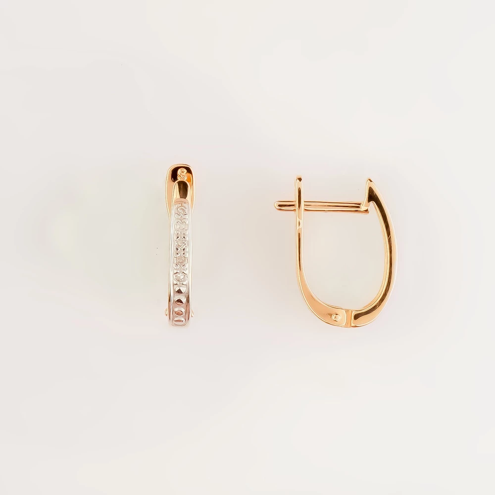 Серьги с бриллиантом из красного золота 585 пробы