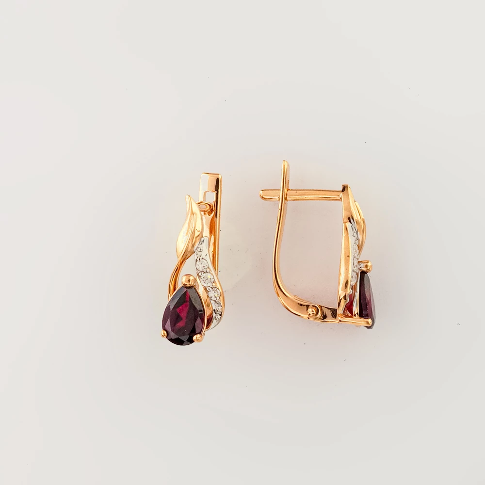 Серьги с бриллиантом из красного золота 585 пробы