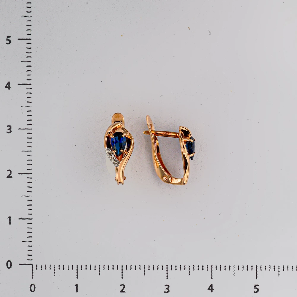 Серьги с сапфиром синтетическим из красного золота 375 пробы Серьги с сапфиром синтетическим из красного золота 375 пробы