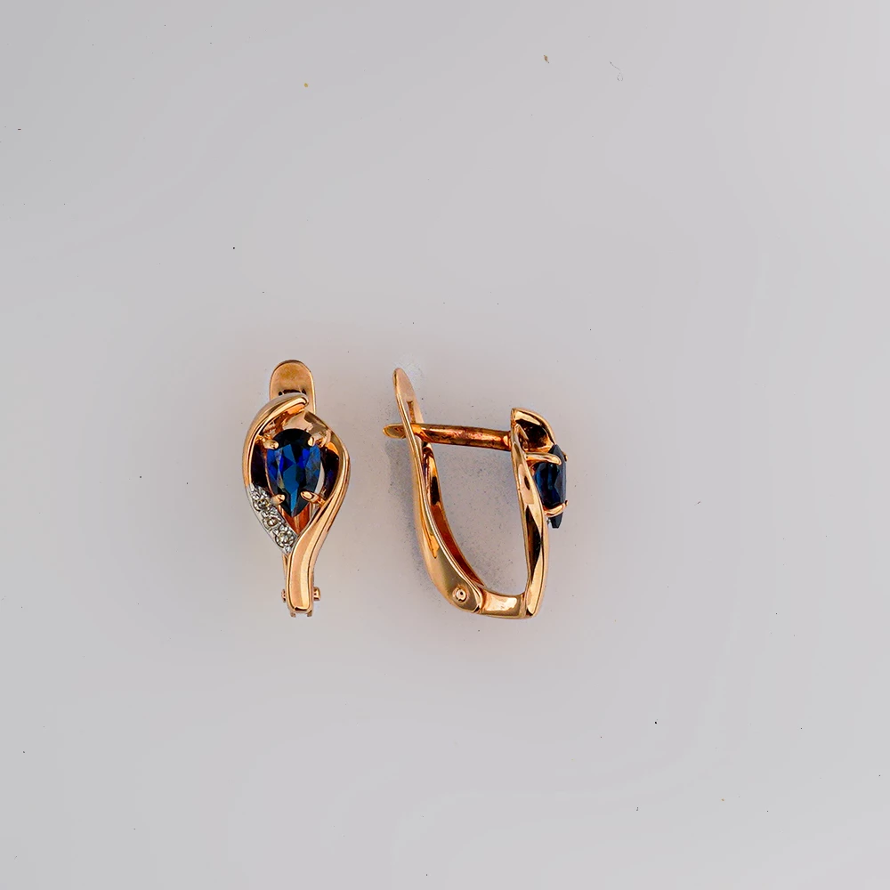 Серьги с сапфиром синтетическим из красного золота 375 пробы Серьги с сапфиром синтетическим из красного золота 375 пробы