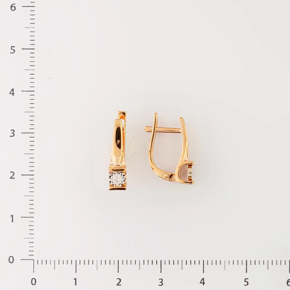 Серьги с бриллиантом из красного золота 585 пробы