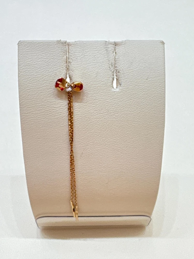 Серьги-продевки с фианитом из красного золота 585 пробы