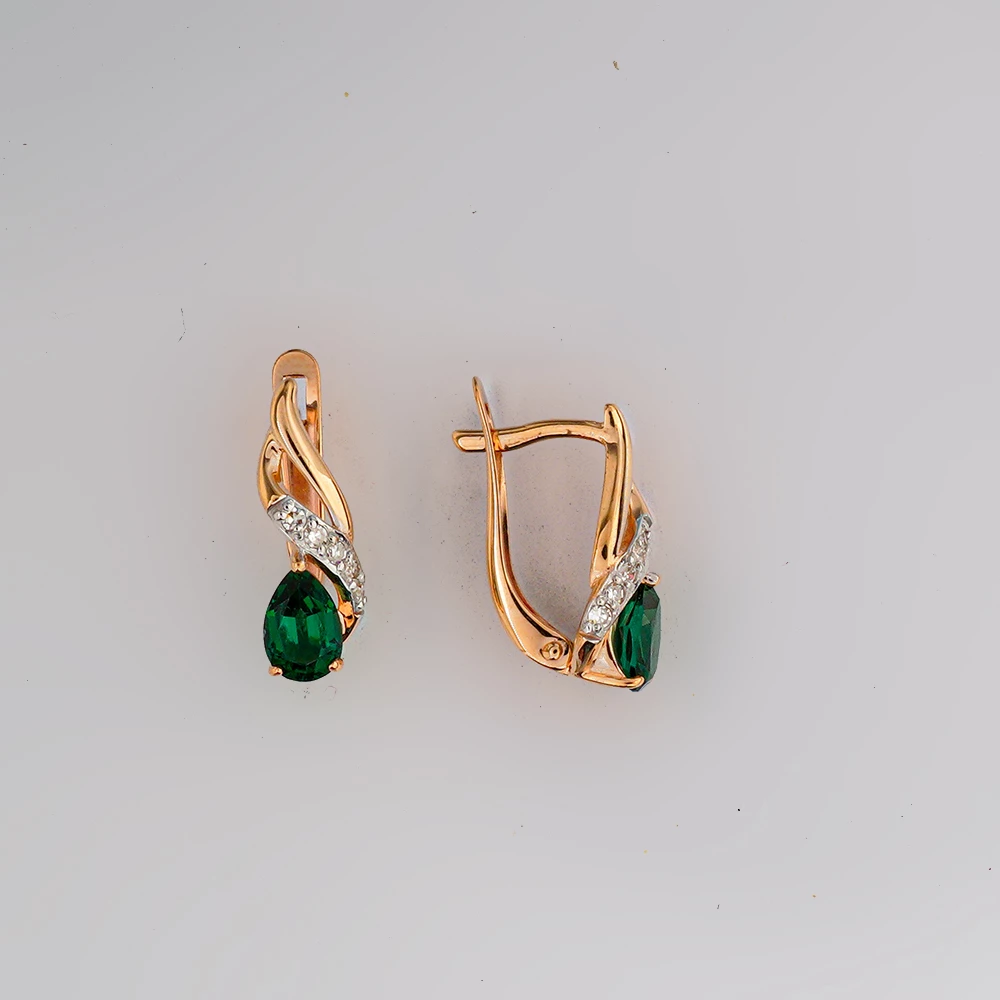 Серьги с бриллиантом из красного золота 585 пробы