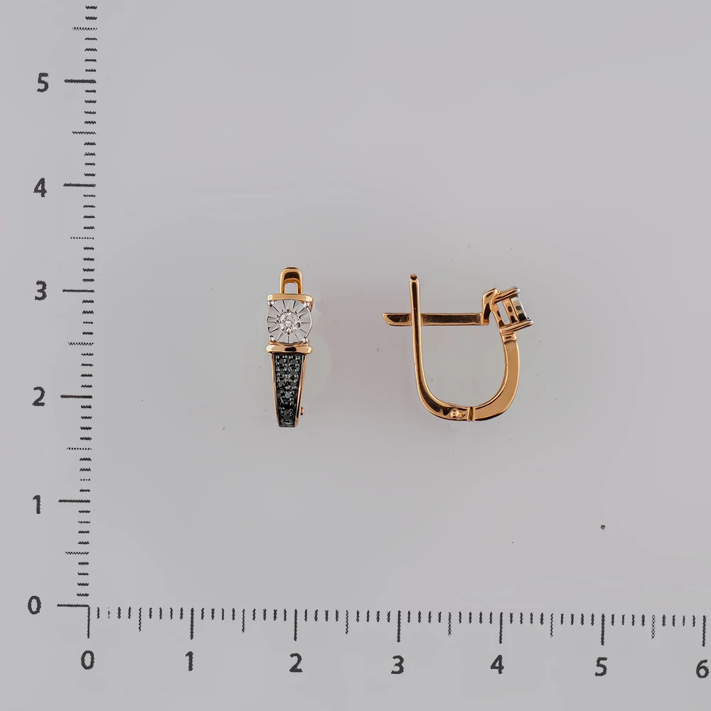 Серьги с бриллиантом из красного золота 585 пробы