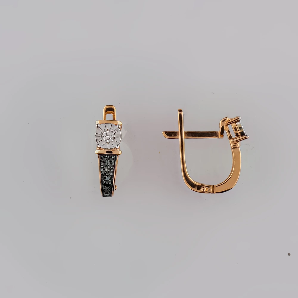 Серьги с бриллиантом из красного золота 585 пробы