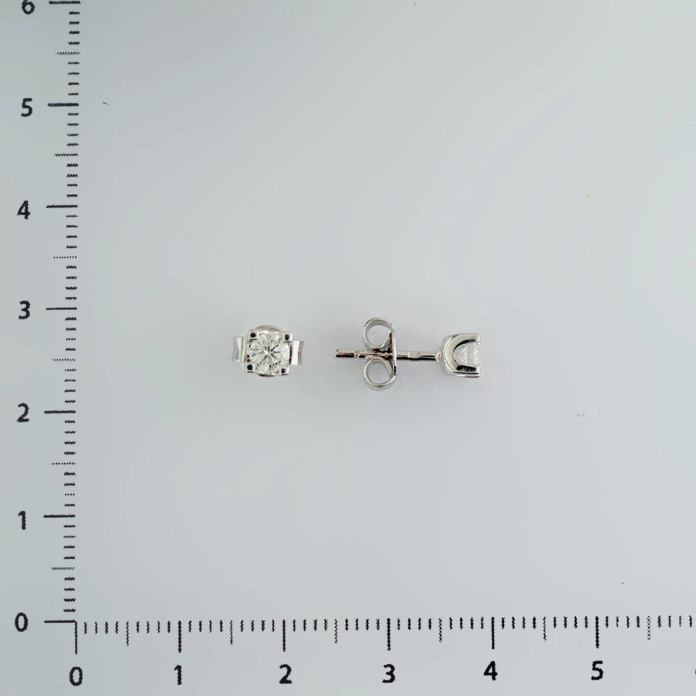 Серьги с бриллиантом из белого золота 585 пробы