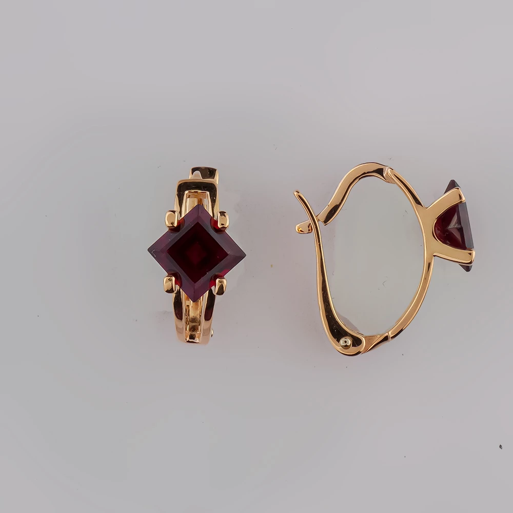 Серьги с гранатом из красного золота 585 пробы