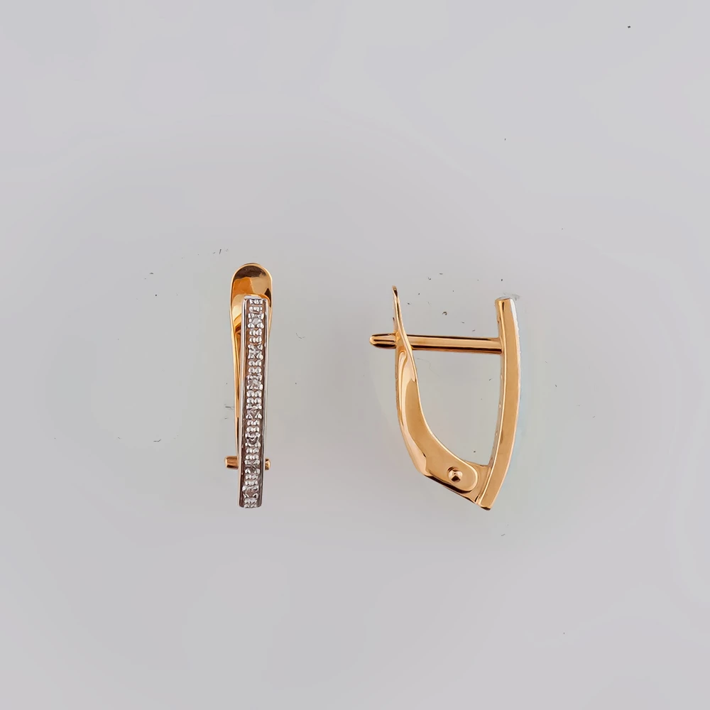 Серьги с бриллиантом из красного золота 585 пробы