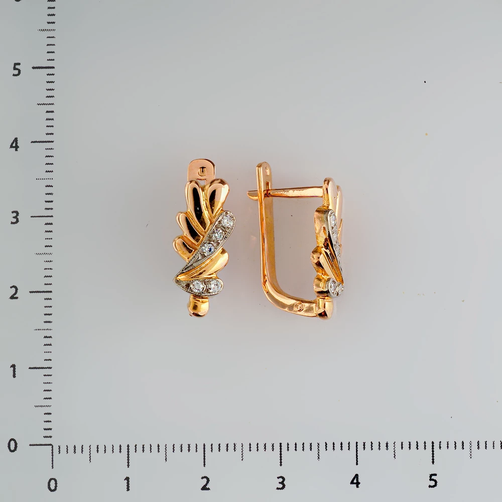 Серьги с бриллиантом из красного золота 583 пробы