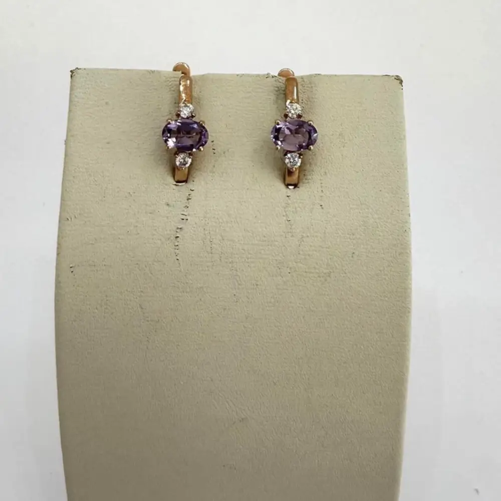 Серьги с аметистом из красного золота 375 пробы