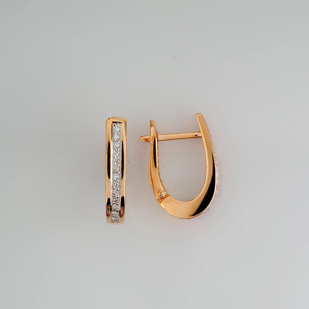 Серьги с бриллиантом из красного золота 585 пробы