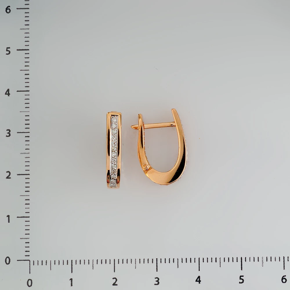 Серьги с бриллиантом из красного золота 585 пробы