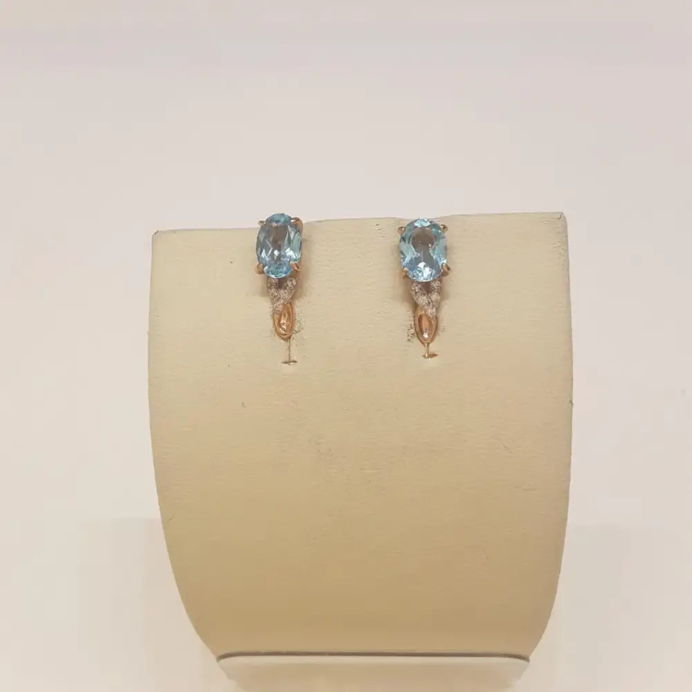 Серьги с топазом из красного золота 585 пробы