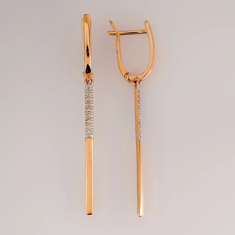 Серьги с бриллиантом из красного золота 585 пробы