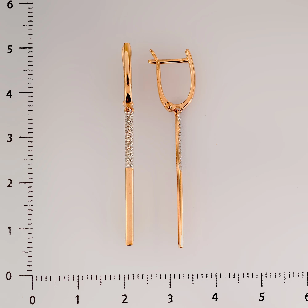 Серьги с бриллиантом из красного золота 585 пробы