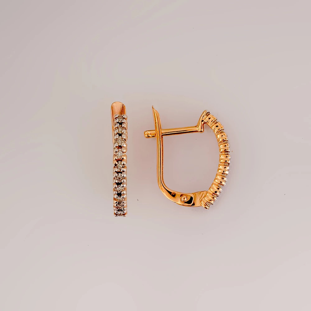 Серьги с бриллиантом из красного золота 585 пробы