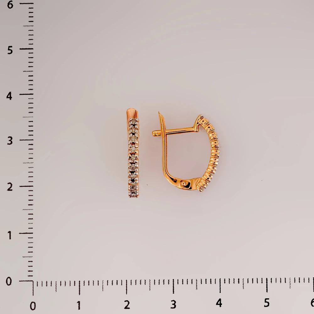 Серьги с бриллиантом из красного золота 585 пробы