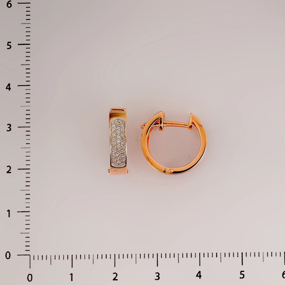 Серьги с бриллиантом из красного золота 585 пробы