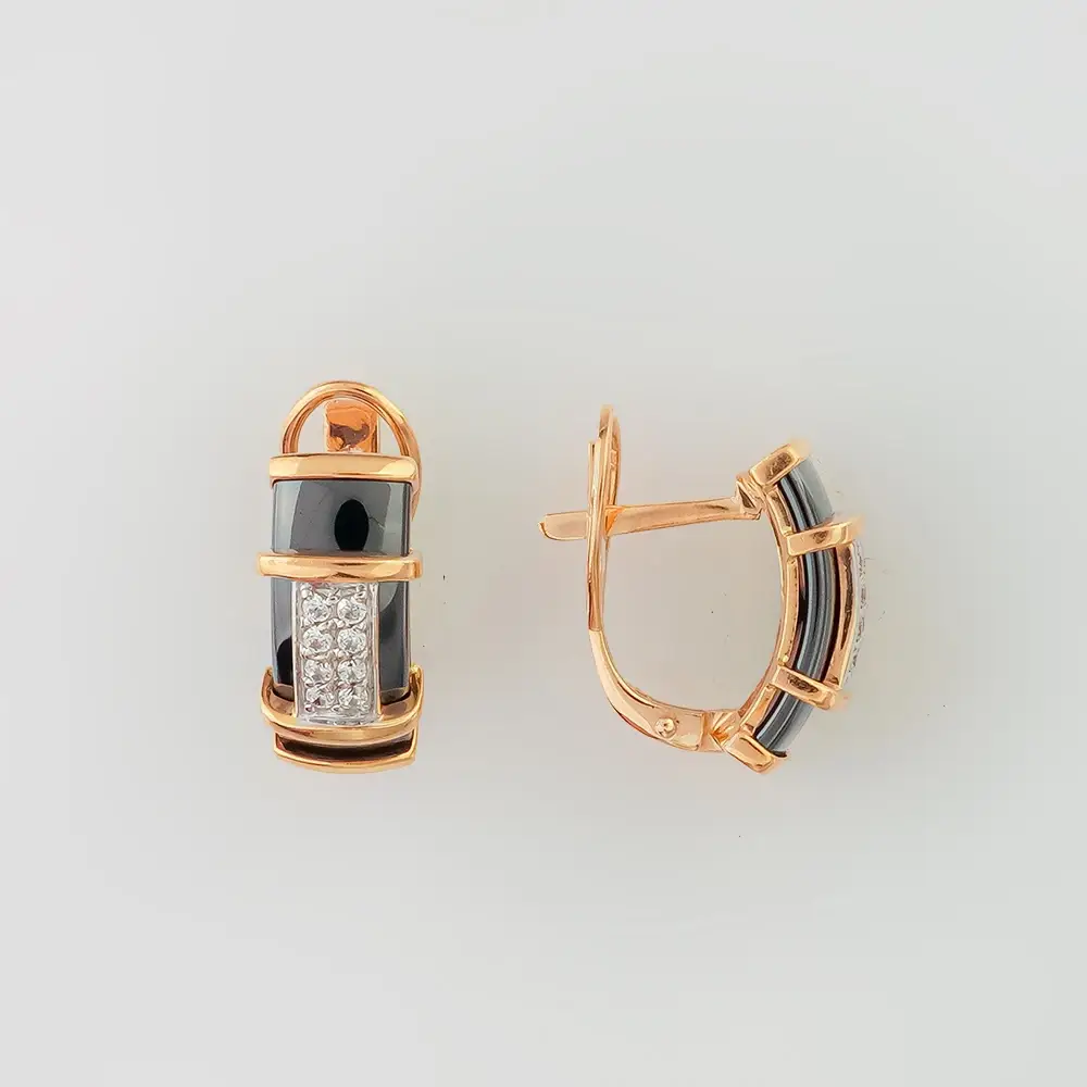 Серьги с ониксом из красного золота 585 пробы