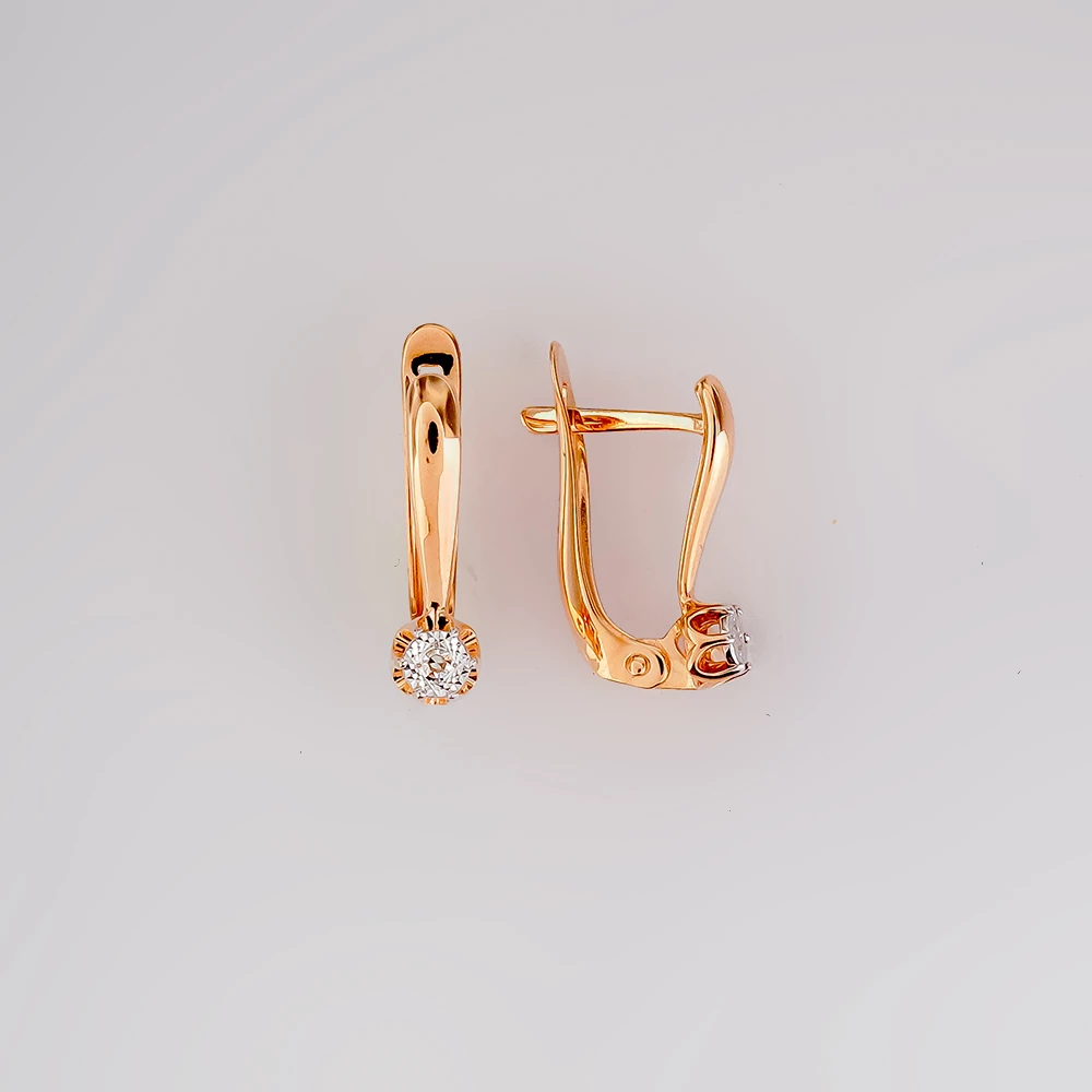 Серьги с бриллиантом из красного золота 585 пробы