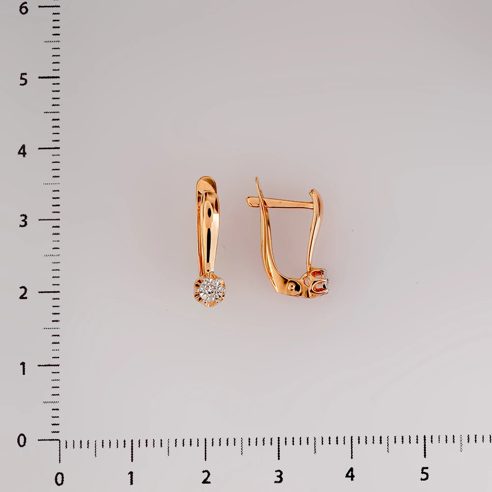 Серьги с бриллиантом из красного золота 585 пробы