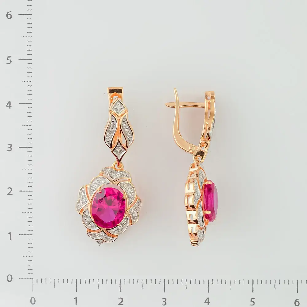 Серьги с бриллиантом из красного золота 585 пробы