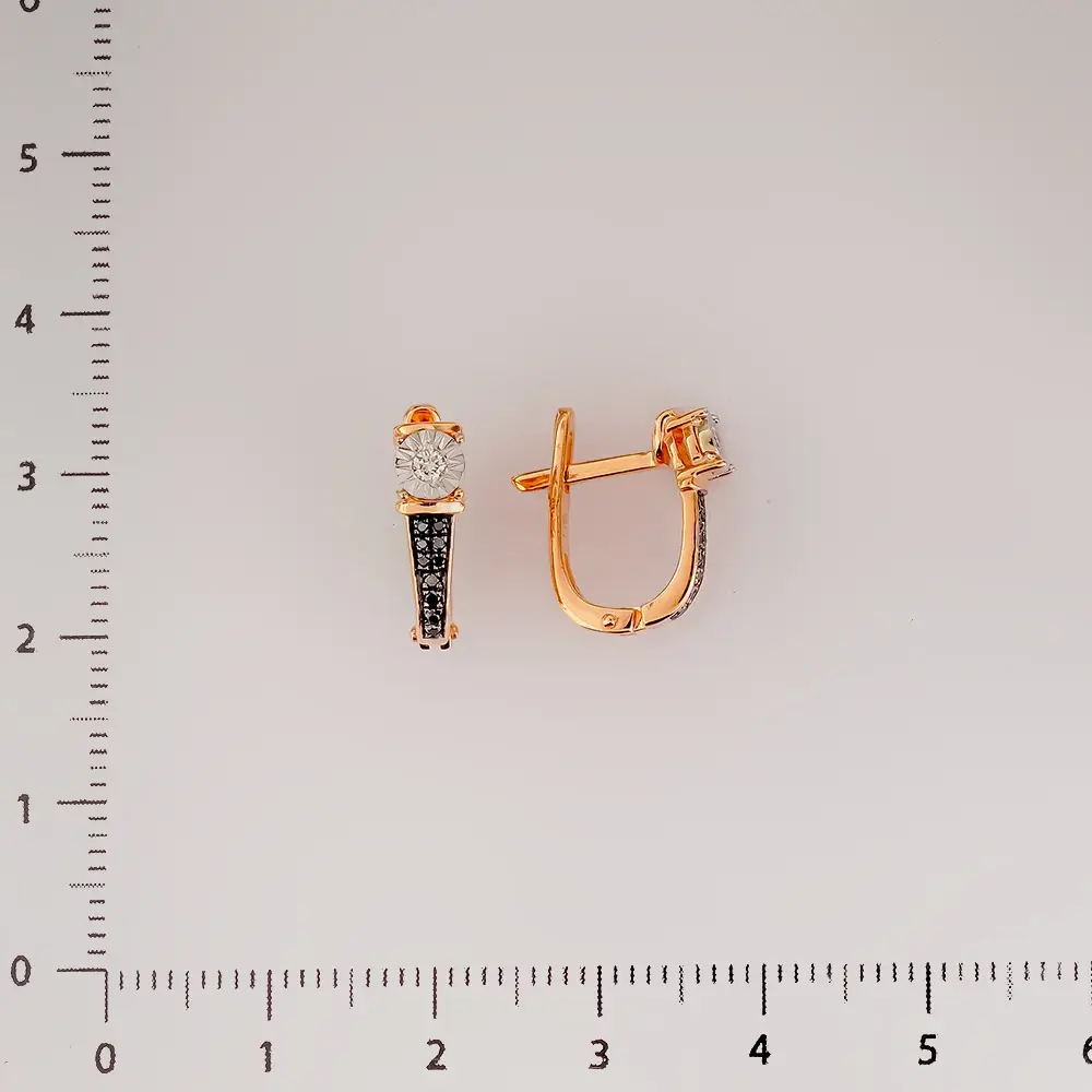 Серьги с бриллиантом из красного золота 585 пробы