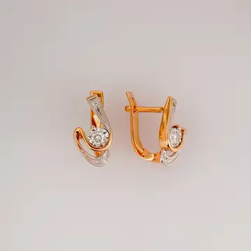 Серьги с бриллиантом из красного золота 585 пробы