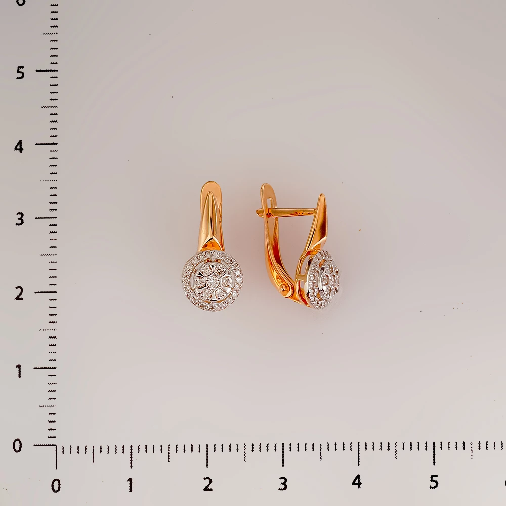 Серьги с бриллиантом из красного золота 585 пробы