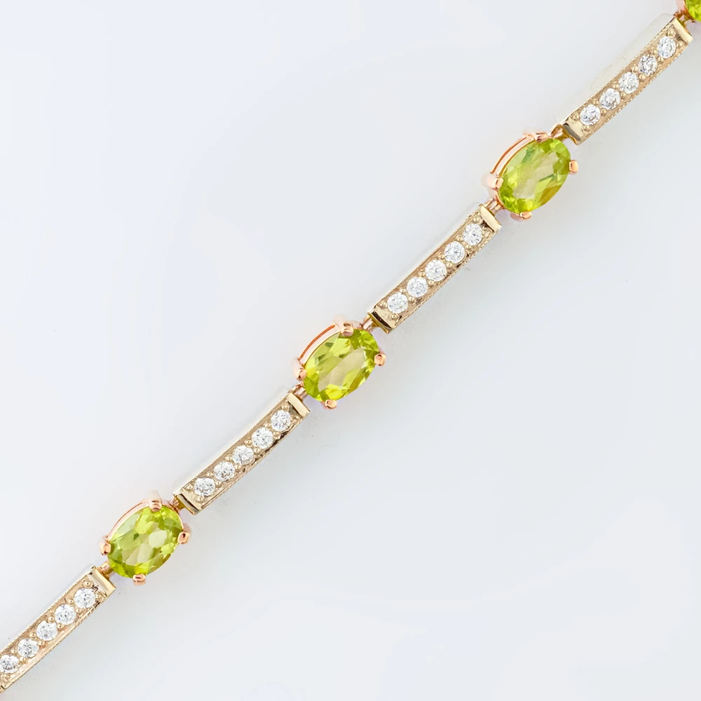 Браслет с хризолитом из красного золота 585 пробы